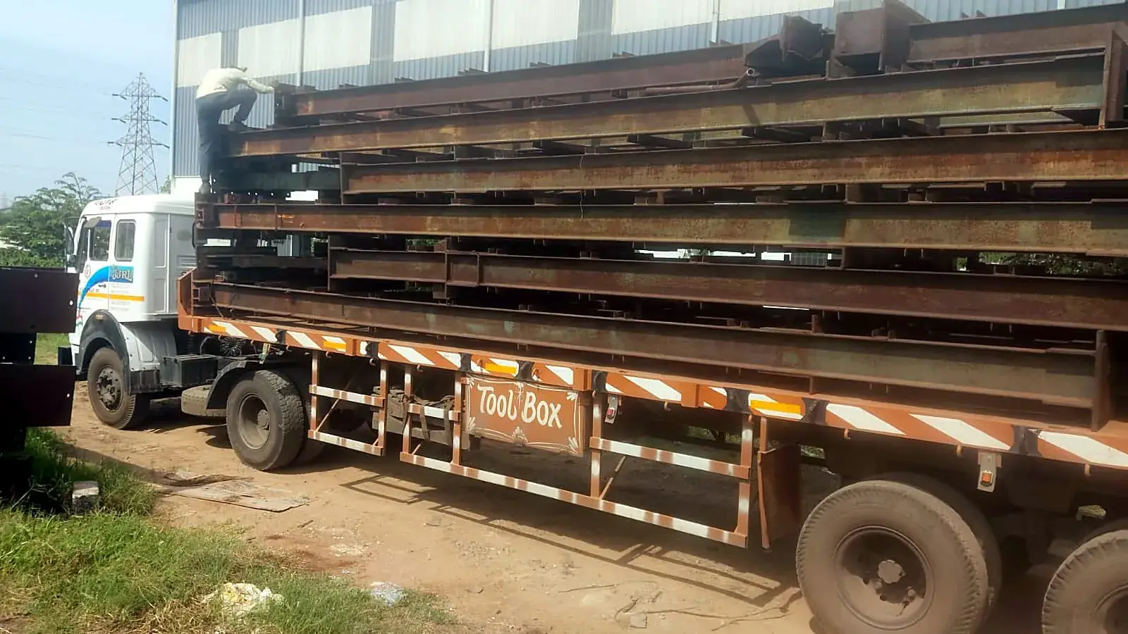 Steel beams loaded on a multi-axle truck