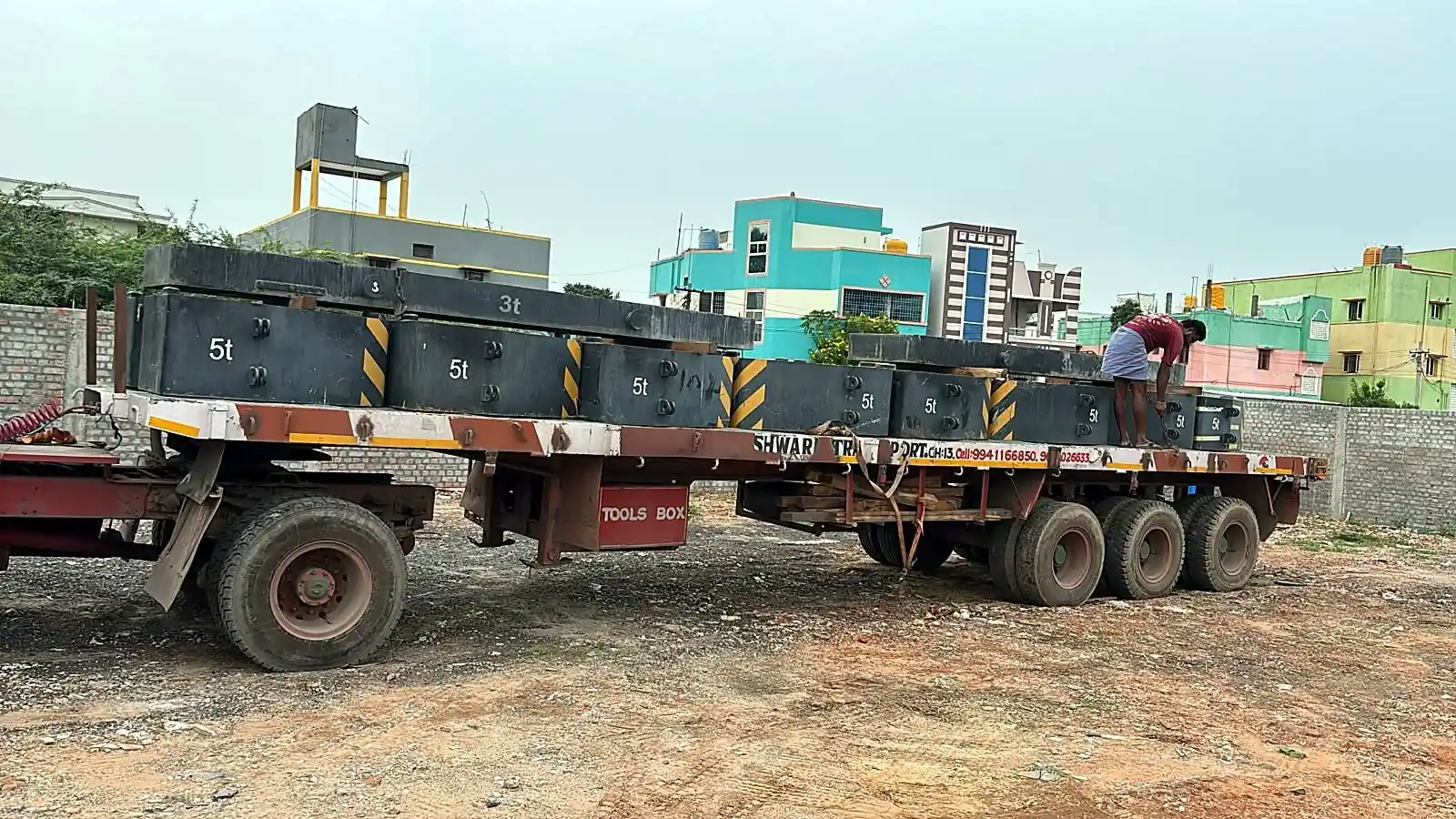 Heavy steel blocks on a flatbed trailer